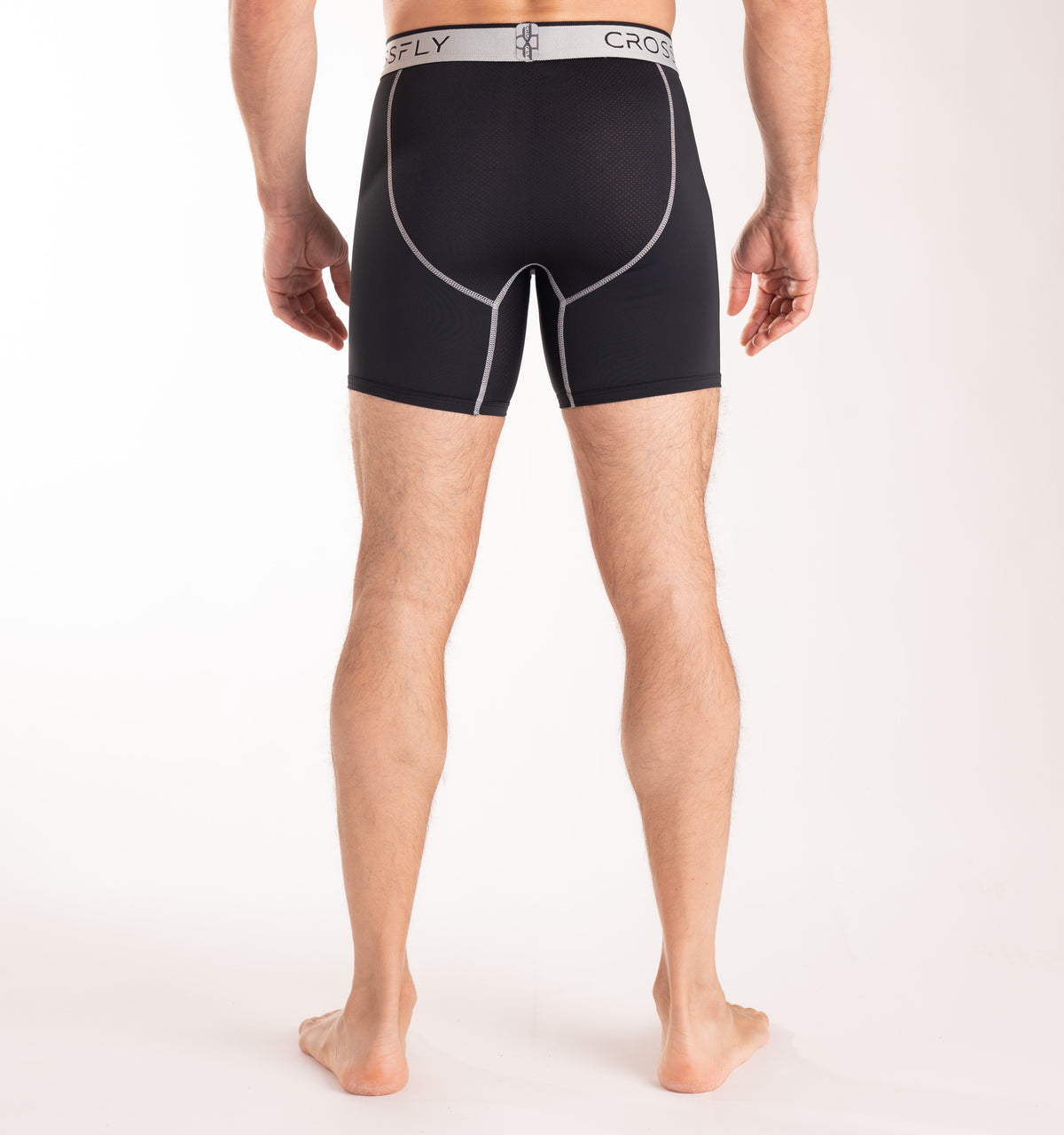 Crossfly men&#39;s Pro 7&quot; black / silver boxers from the Performance series, featuring X-Fly and Coccoon internal pocket support.