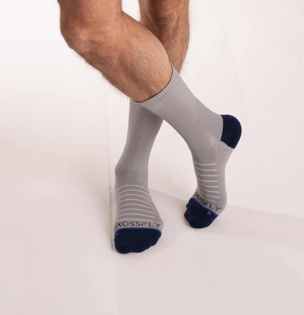 Crossfly men&#39;s Hero Crew Socks in grey from the Performance series, featuring AirBeams and 180 Hold.
